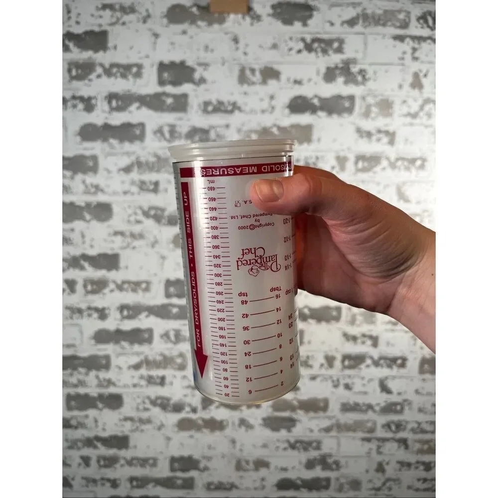 Pampered chef | wet and dry measuring cup dispenser